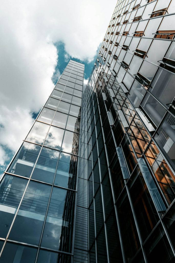 Modern office building with reflection in windows of the building